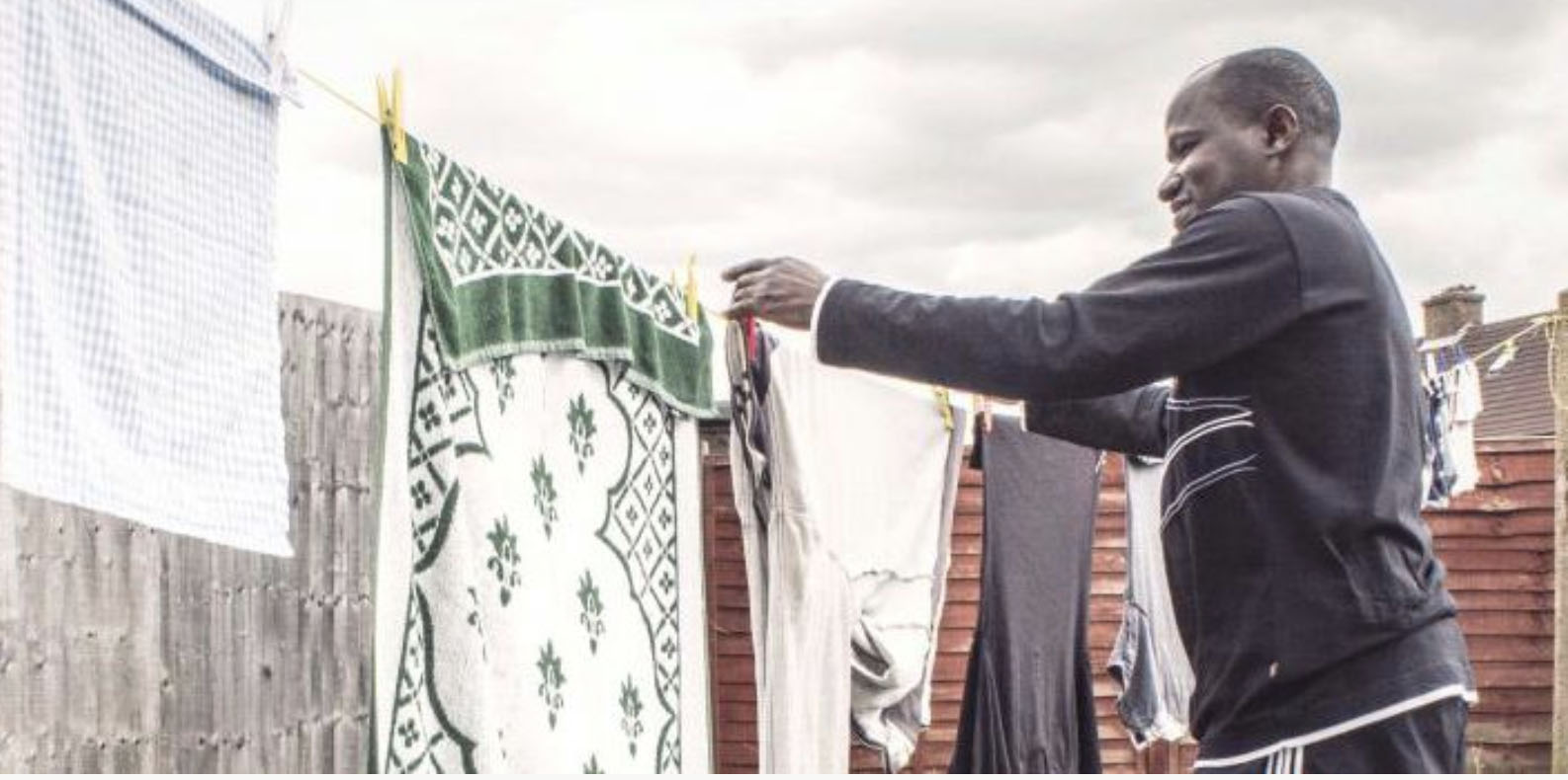 Man hanging up laundry