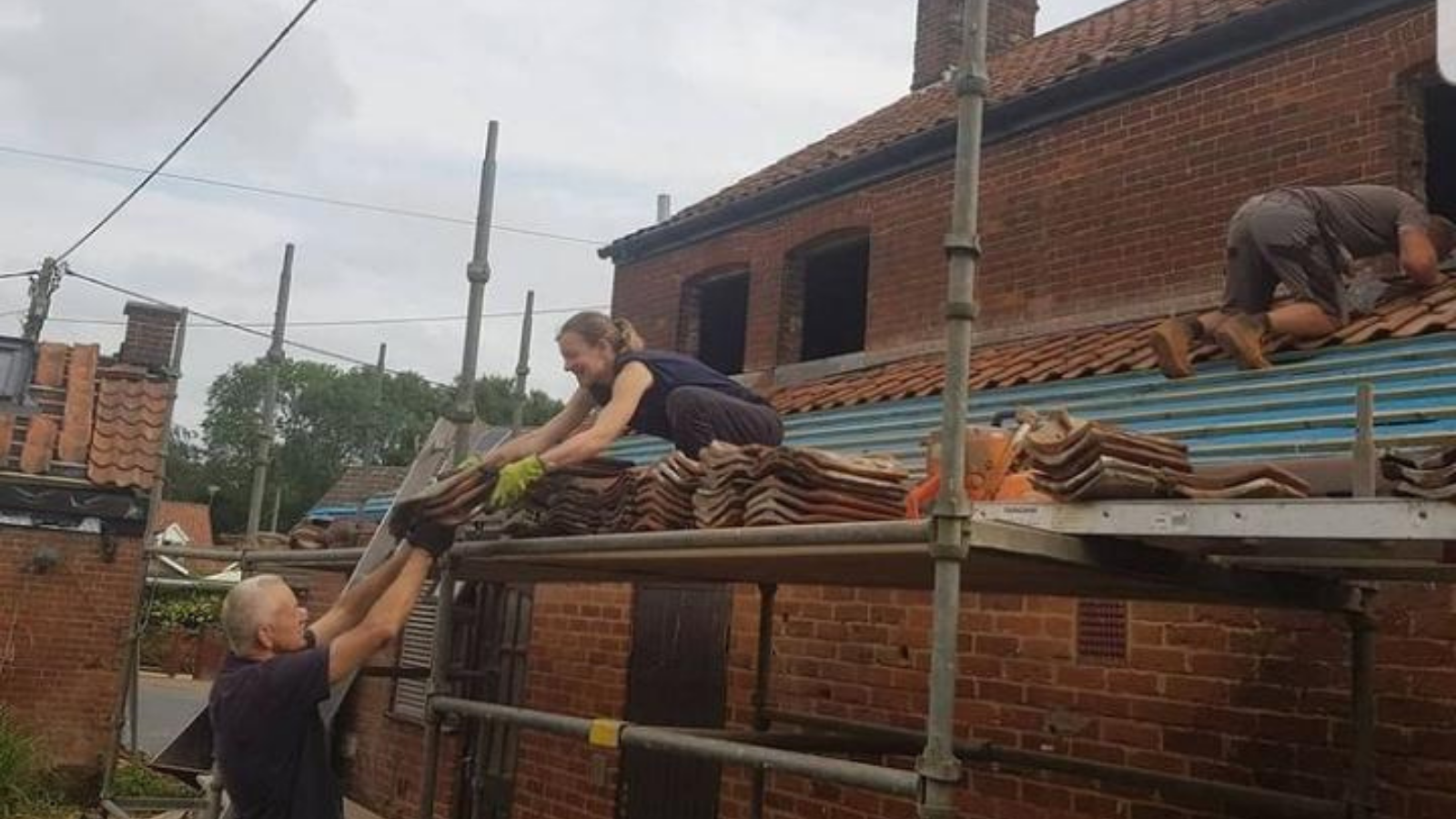 Volunteers building at The White Swan 