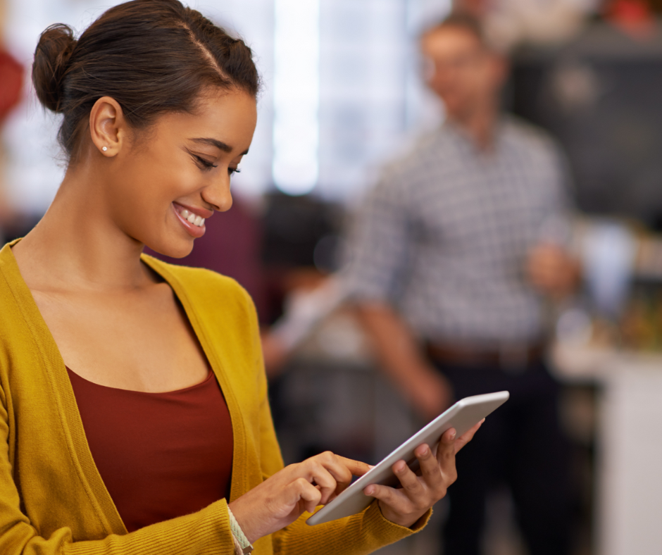 Investor using a tablet to search for social enterprises and charities