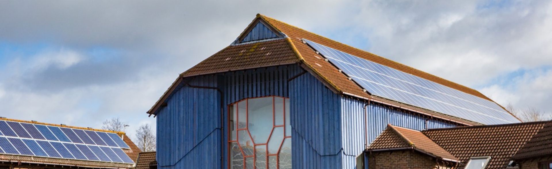 Wolverton Communtiy Energy - outside of a building with solar panels on