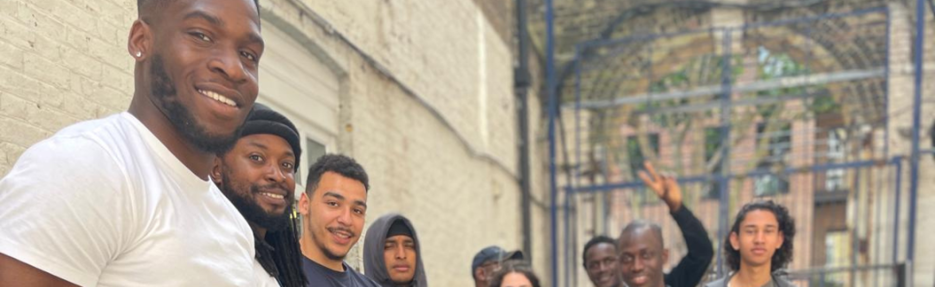 A group of people smiling outside