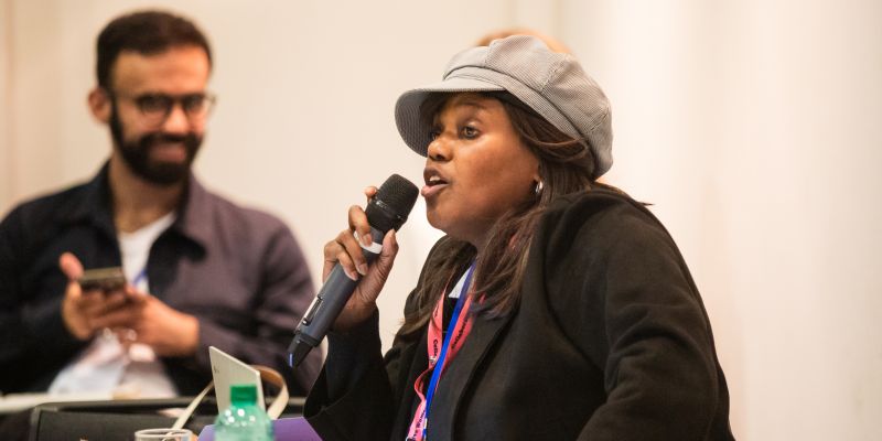 Woman speaking with microphone