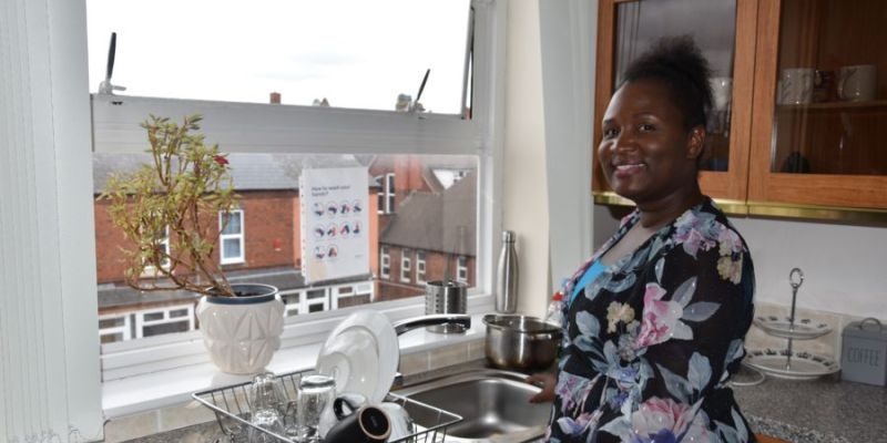 Woman smiling inside house
