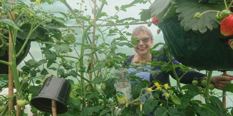 Image of a woman in the community garden 